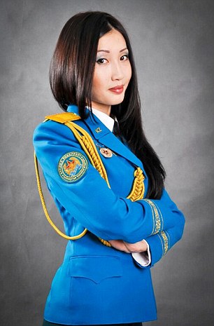Pic shows: Batyrbaeva Umit Ganievna. Military officials in Borat’s homeland Kazakhstan have introduced a Miss Army competition to encourage more people to sign up for duty. The Kazakhstani Ministry of Defence has chosen 123 of its prettiest female soldiers and posted their photos online where viewers can vote for their faves. The photos show the women posing in three set poses: one with military uniform, one with weapons and one in civilian clothes - and they have already been seen by over 30,000. A spokesman for the MOD said: "Voting began this week and the competition is open until the 10th of May. "We’ve been flooded with views and the clear favourite at the moment is Sergeant Aigerin Karakuchukova who is in the lead with over 1,100 votes. "There is still a long way to go though and anyone could win." The spokesman revealed that the competition was also open to voters not only from Kazakhstan but also neighbouring countries Krygystan, Azerbaijan and Russia. Voter Nicephorus Bocharov, 34, said: "There are certainly some fine looking women in there, although I’m not sure it would make me want to sign up and fight. "Still, am very happy to look at them and imagine what it would be like to take them on in a full on assault." Another fan, Emil Efremov, 32, said: "I think this is a very good idea. "After the world was introduced to Borat people have the impression that everyone hear lives on a farm and sleeps with donkeys. "These photos show that Kazakh women are as beautiful as any others. "I have voted for all of them." The MOD spokesman said: "The winner will receive a cash prize and have the knowledge of knowing she is the most beautiful woman soldier in Kazakhstan. "And hopefully, she'll have the pleasure of knowing she attracted hundreds of young men to join up." (ends)       