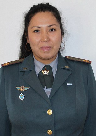 Pic shows: Dzhanabaeva Zarina Sabitzhanovna. Military officials in Borat’s homeland Kazakhstan have introduced a Miss Army competition to encourage more people to sign up for duty. The Kazakhstani Ministry of Defence has chosen 123 of its prettiest female soldiers and posted their photos online where viewers can vote for their faves. The photos show the women posing in three set poses: one with military uniform, one with weapons and one in civilian clothes - and they have already been seen by over 30,000. A spokesman for the MOD said: "Voting began this week and the competition is open until the 10th of May. "We’ve been flooded with views and the clear favourite at the moment is Sergeant Aigerin Karakuchukova who is in the lead with over 1,100 votes. "There is still a long way to go though and anyone could win." The spokesman revealed that the competition was also open to voters not only from Kazakhstan but also neighbouring countries Krygystan, Azerbaijan and Russia. Voter Nicephorus Bocharov, 34, said: "There are certainly some fine looking women in there, although I’m not sure it would make me want to sign up and fight. "Still, am very happy to look at them and imagine what it would be like to take them on in a full on assault." Another fan, Emil Efremov, 32, said: "I think this is a very good idea. "After the world was introduced to Borat people have the impression that everyone hear lives on a farm and sleeps with donkeys. "These photos show that Kazakh women are as beautiful as any others. "I have voted for all of them." The MOD spokesman said: "The winner will receive a cash prize and have the knowledge of knowing she is the most beautiful woman soldier in Kazakhstan. "And hopefully, she'll have the pleasure of knowing she attracted hundreds of young men to join up." (ends)       