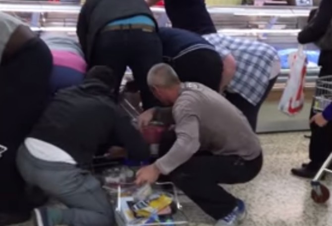 Shoppers Wrestle For Meat