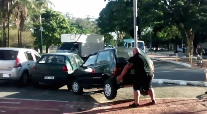 Insanely Strong Guy Lifts Car