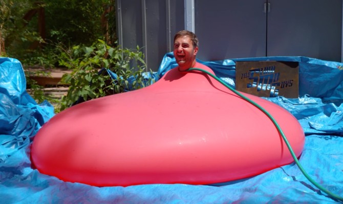 Man Explodes Giant Water Ballon Slow Motion