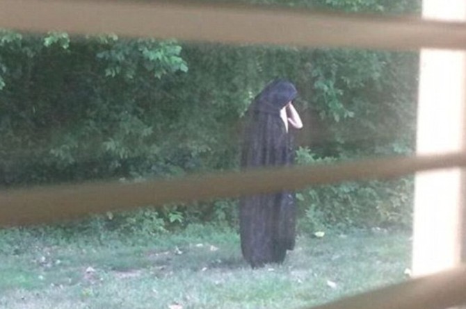 Cloaked Figure