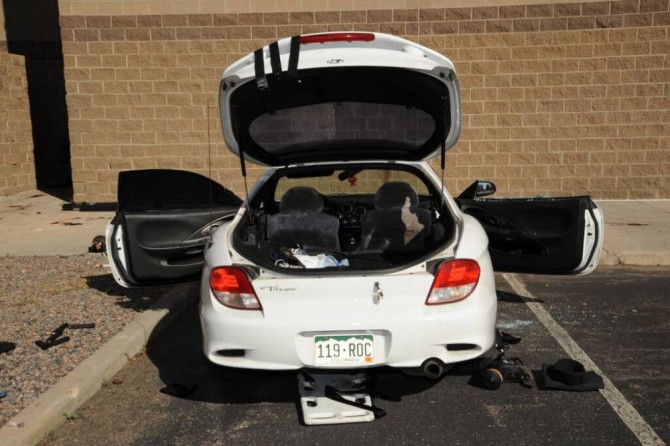 This July 2012 evidence photo, which the Arapahoe County District Attorney's Office released in response to open-records requests, shows the car of Colorado theater shooter James Holmes, parked behind the movie theater following the shooting in Aurora, Colo. In August 2015, Holmes was sentenced to life in prison because jurors could not agree that he deserved the death penalty. (Arapahoe County District Attorney's Office via AP)