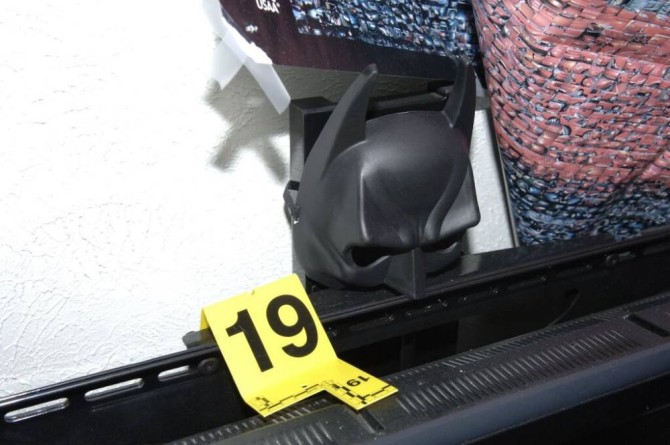 This July 2012 evidence photo, which the Arapahoe County District Attorney's Office released in response to open-records requests, shows a Batman mask numbered for evidence inside the apartment of Colorado theater shooter James Holmes, in Aurora, Colo. In August 2015, Holmes was sentenced to life in prison because jurors could not agree that he deserved the death penalty. (Arapahoe County District Attorney's Office via AP)