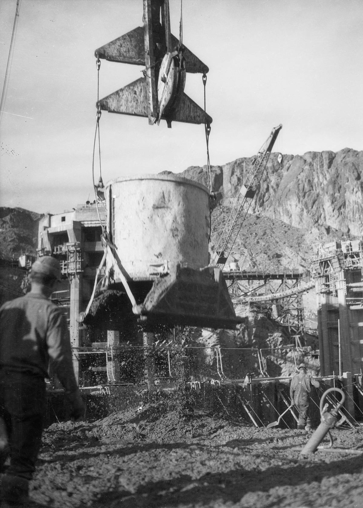 1934 --- Concrete being dumper from conveyer dw-1934-412-08-67~35 --- Image by © Dick Whittington Studio/Corbis