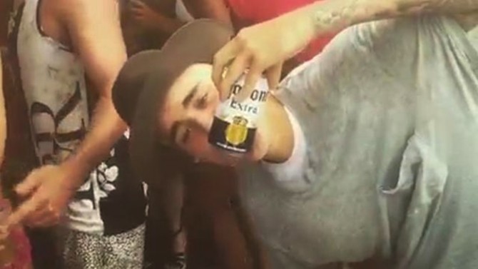 Justin Bieber Shotgunning Beers
