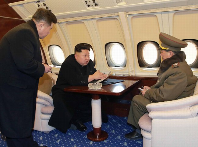 Kim Jong Un Looking At Things - Table