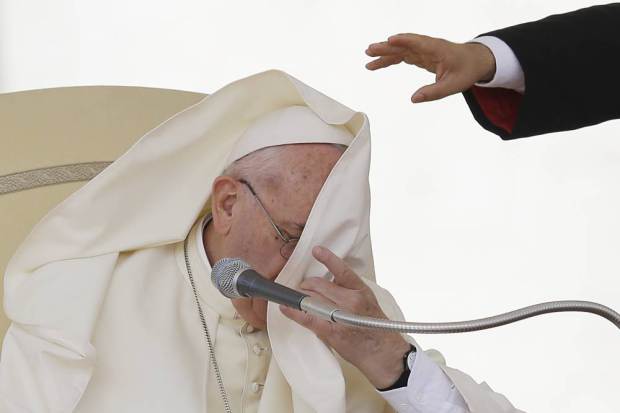 A gust of wind blows Pope Francis' mantle during the weekly general audience in St. Peter's Square at the Vatican, Wednesday, Sept. 16, 2015. (AP Photo/Gregorio Borgia)