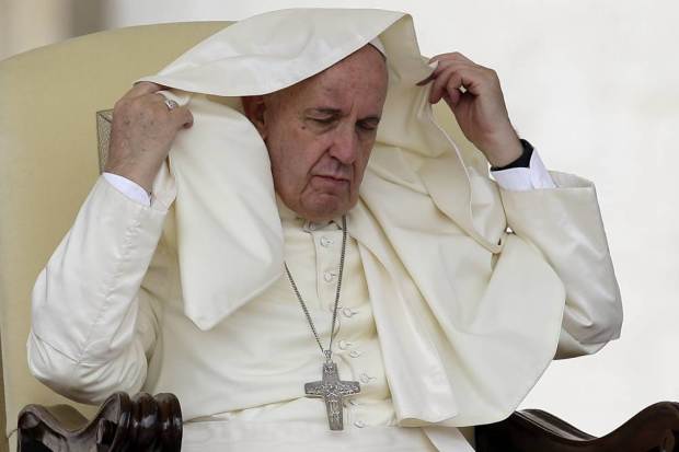 A gust of wind blows Pope Francis' mantle during the weekly general audience in St. Peter's Square at the Vatican, Wednesday, Sept. 16, 2015. (AP Photo/Gregorio Borgia)