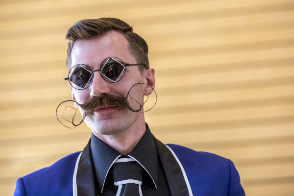 LEOGANG, AUSTRIA - OCTOBER 3: Contestants line up for judging in the 'Mustache Naturale' category at the 2015 World Beard And Mustache Championships on October 3, 2015 in Leogang, Austria. Over 300 contestants in teams from across the globe have come to compete in sixteen different categories in three groups: mustache, partial beard and full beard. The event takes place every few years at different locations worldwide. (Photo by Jan Hetfleisch/Getty Images)