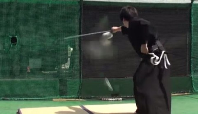 Japanese Samurai Slices Baseball