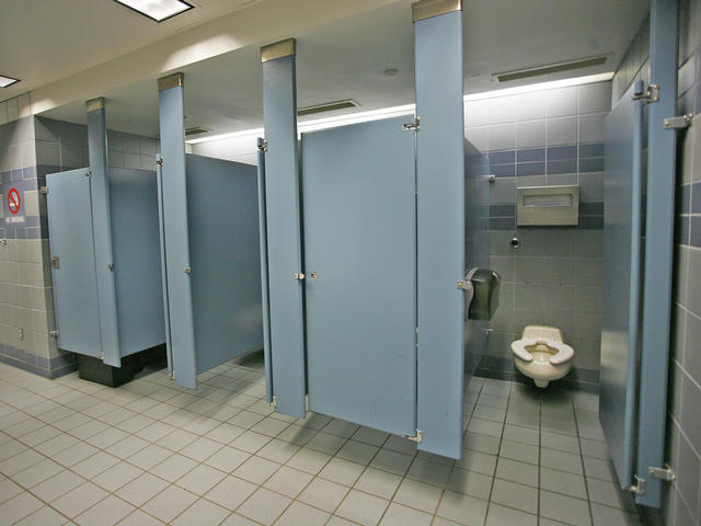 **CORRECTS DATE TO SEPT. 17 ** The stalls in the men's room at the Minneapolis St. Paul International Airport where U.S. Sen. Larry Craig, R-Idaho, was arrested June 11 by a Minneapolis airport police officer., are shown Monday Sept. 17, 2007. The Idaho Republican pleaded guilty to misdemeanor disorderly conduct. Craig has since said his guilty plea was a mistake. "It's become a tourist attraction," said Karen Evans, information specialist at the Minneapolis-St. Paul International Airport. "People are taking pictures." AP Photo/Andy King)