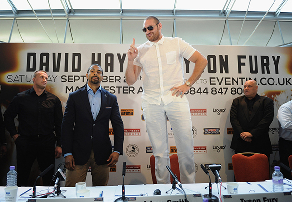 LONDON, ENGLAND - JULY 11: British heavyweight boxers Tyson Fury (C) and David Haye (2nd L) attend a press conference on July 11, 2013 in London, England. (Photo by Shaun Botterill/Getty Images)