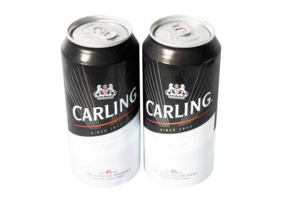 DTE1NH Two cans of Carling lager