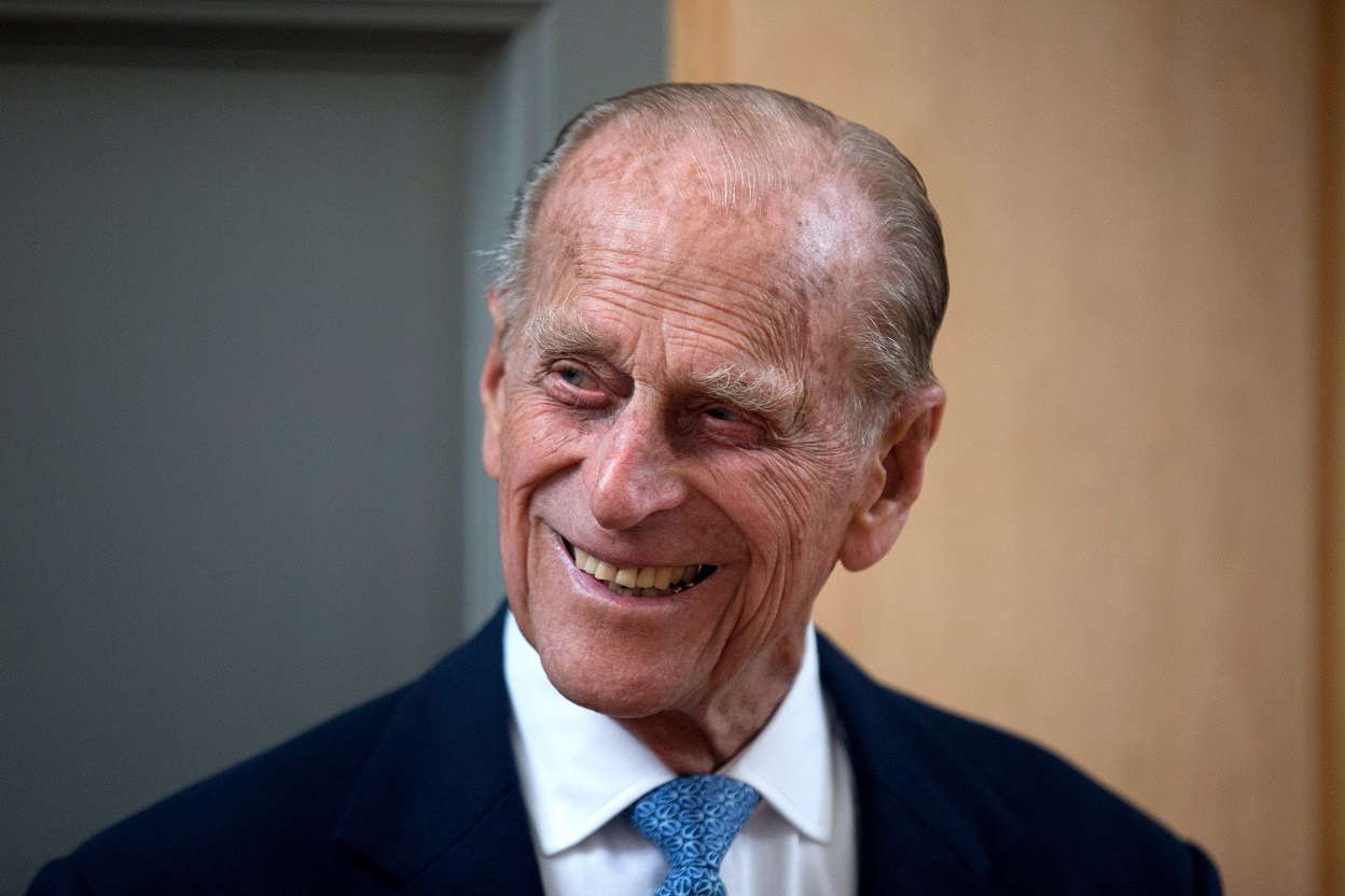 LONDON, ENGLAND - JUNE 8: Prince Philip, Duke of Edinburgh, smiles after unveiling a plaque at the end of his visit to Richmond Adult Community College in Richmond on June 8, 2015 in London, England. Prince Philip, officially opened and was shown round the new art, drama and dance facilities at the further education college which offers up to 2,000 courses. (Photo by Matt Dunham - WPA Pool / Getty Images)