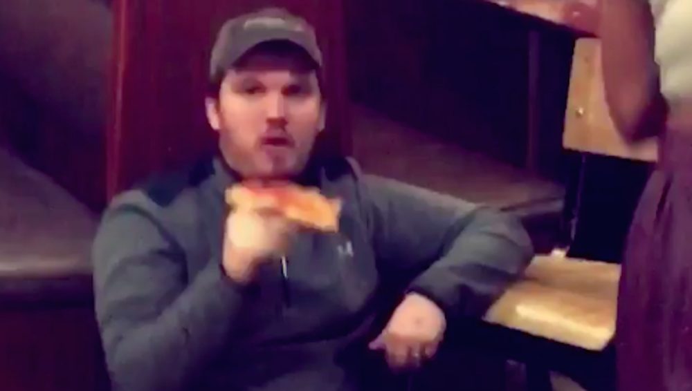 Guy Eating Pizza