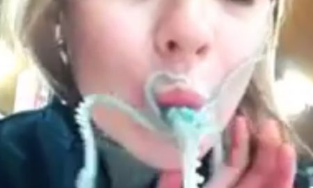 Woman Eating Live Octopus