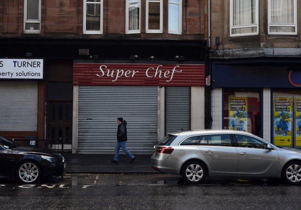 GV showing Super Chef on Glasgow's Paisley Road West where 17 different takeaways have been hit with food hygiene warnings, MAY 02 2016 See SWNS story SWDIRTY; This city centre street could be the most dangerous place in Britain to get a takeaway - after 17 fast food joints were hit with food hygiene warnings. Environmental health chiefs have swooped on a series of Indian, Italian, Chinese and Turkish takeaways on Glasgow's Paisley Road West in the past year. Now the three-and-a-half mile stretch of road is in the running for the dubious honour of most risky place in Britain to buy a bag of chips. A dozen of the takeaways were slapped with "improvement required" notices last year and a further five premises have had them issued so far this year.