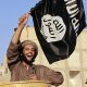 An Isis fighter takes part in a military parade