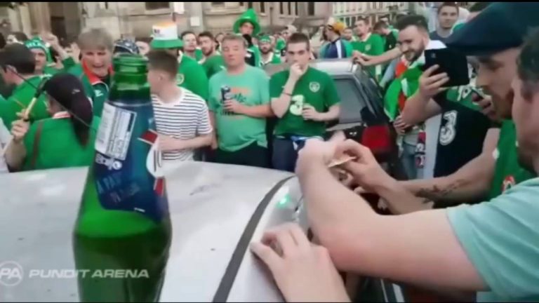 Irish Football Fans Dent Car While Partying; Immediately Fix It While Singing