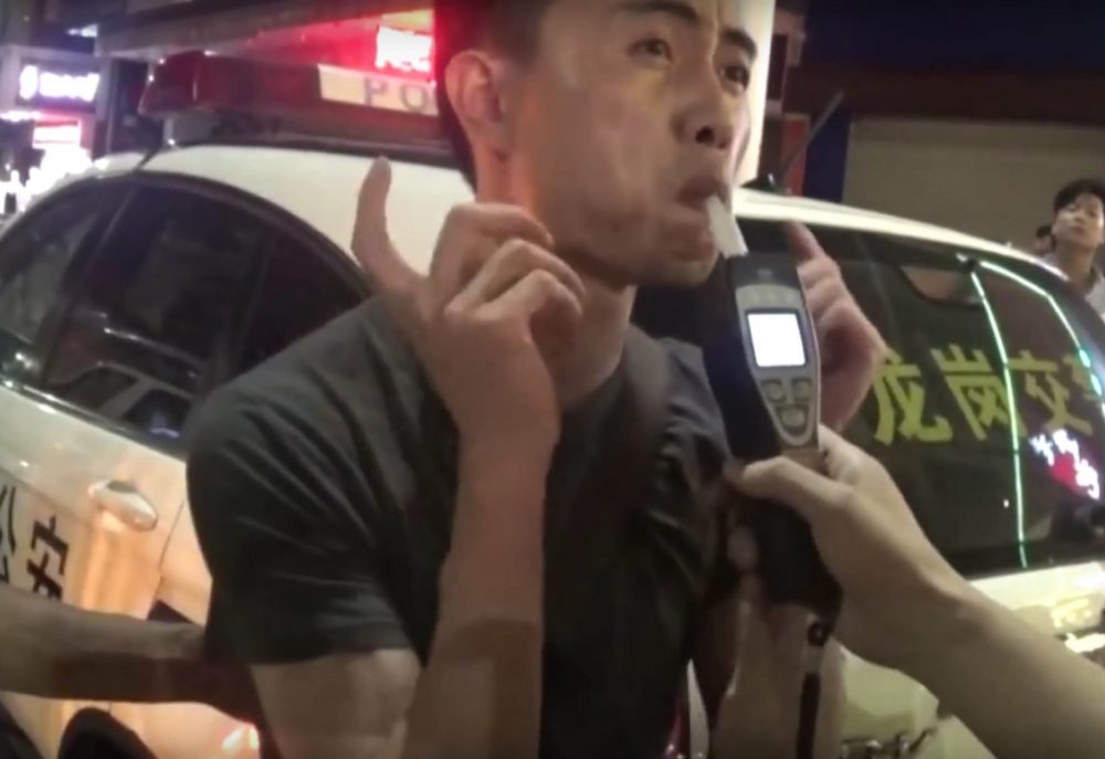 Man faking Breathalyser