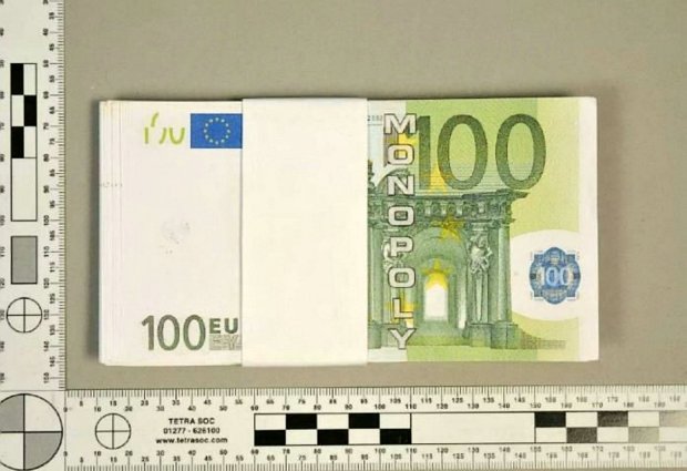The fake cash which was used in the 'Monopoly money' fraud case which has been heard at Bristol Crown Court. See SWNS story SWFAKE; Five people, including four from the same family, have been jailed for their parts in fraud, theft and money laundering offences. øThis follows an investigation into organised frauds, including an elaborate fraud in Bristol, where a jeweller lost £420,000 worth of diamonds, diamond rings and watches, another in London where a jeweller was defrauded to the value of øÄ7.7million, a £250,000 theft in Wiltshire and a £200,000 theft in Leeds. øBristol Crown Court heard that in the Bristol fraud a jeweller from South Wales met members of the group at the Marriott Hotel, Lower Castle Street in August 2014. øThe offenders paid the jeweller a bankerís draft for the diamonds and apparently genuine Euros for the watches. After a problem was discovered with the bankerís draft, it was agreed he would be given Euros as security to cover the value of the draft, until it was corrected the next day.