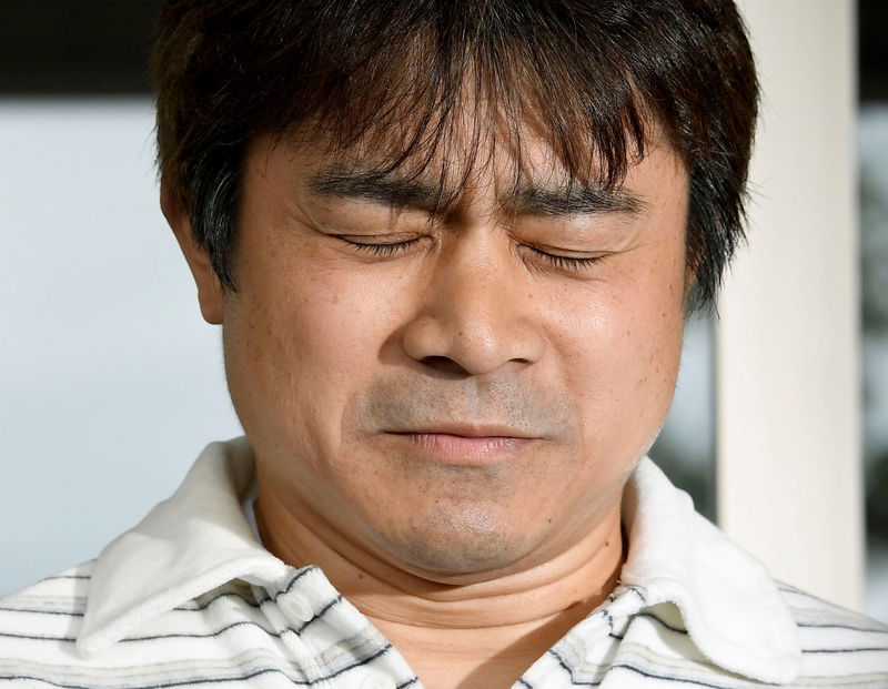 Takayuki Tanooka, father of 7-year-old boy Yamato Tanooka who went missing on May 28, 2016 after being left behind by his parents, was found alive, reacts as he speaks to the media in Hakodate