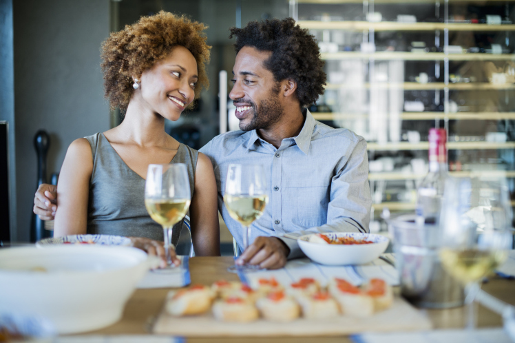 Romantic couple at a dinner party