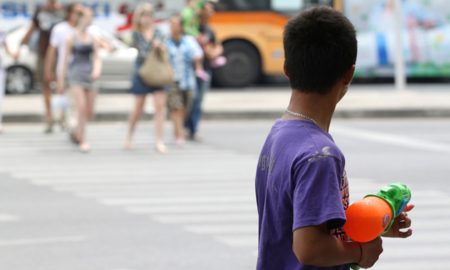kid with water gun