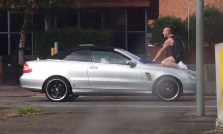 Angry Man Punches Windshield