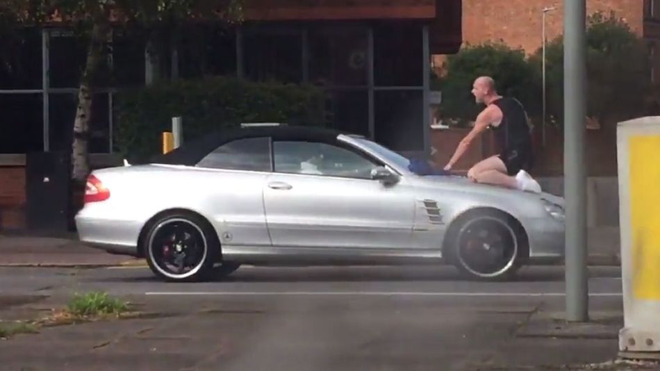 Angry Man Punches Windshield