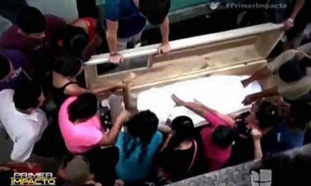 Family Unearth Coffin