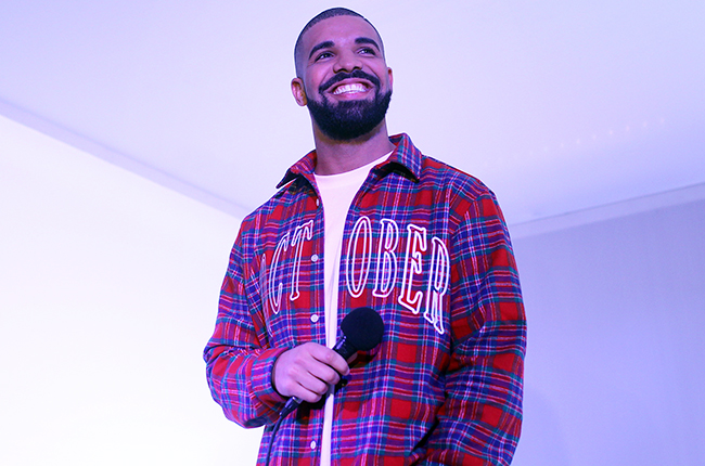 TORONTO, ON - NOVEMBER 25 - Toronto Rapper Drake addresses media in a 'Hotline Bling' installation at the Air Canada Centre in Toronto on November 25, 2015, prior to a Toronto Raptors vs. Cleveland Cavaliers NBA game. (Cole Burston/Toronto Star via Getty Images)