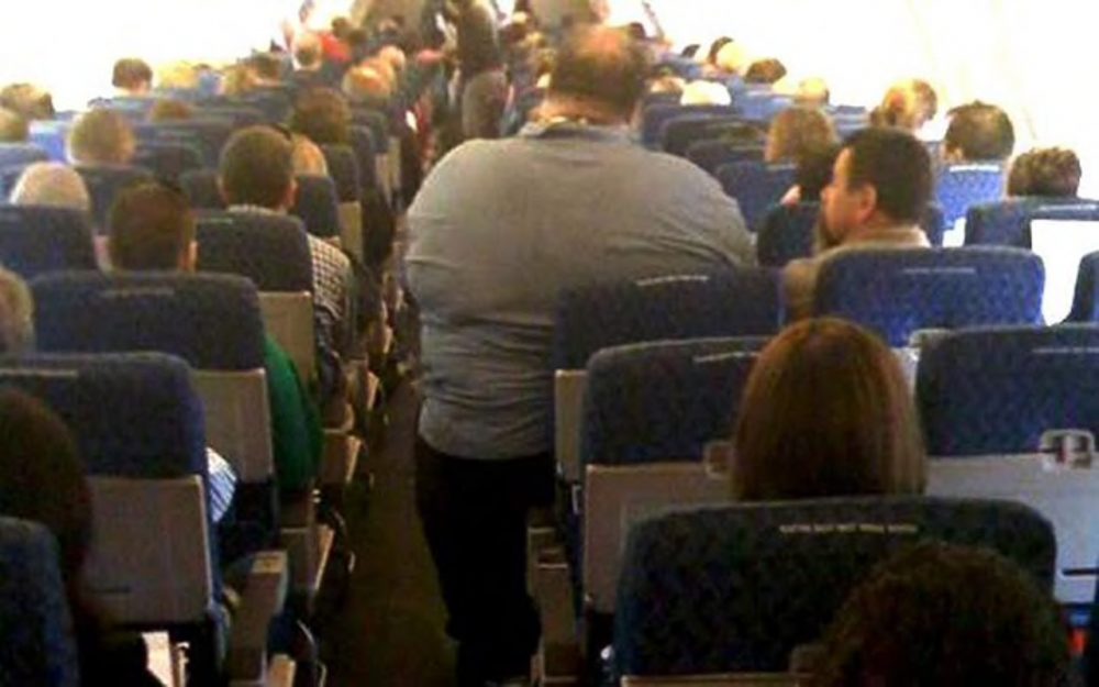 fat-man-on-plane