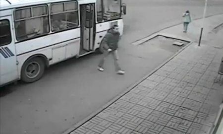 guy-jumps-off-bus