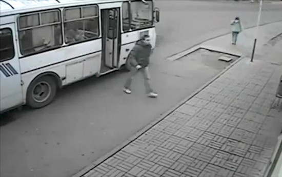 guy-jumps-off-bus