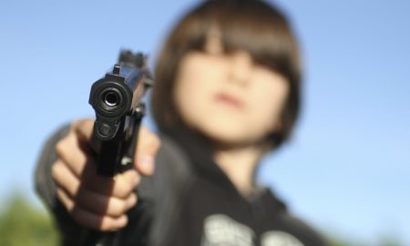 Kid with gun