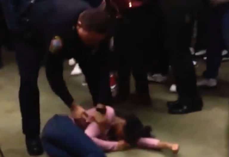 cop-slams-girl