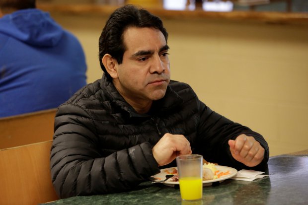 Mexican migrant Roberto Beristain eats at a migrant shelter after being deported by U.S. immigration authorities, in Ciudad Juarez