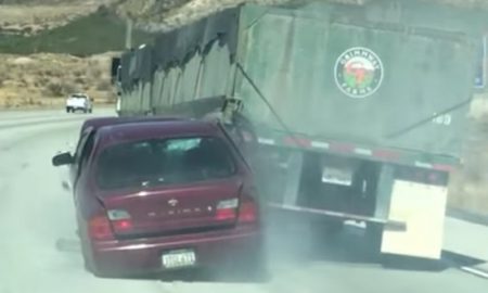 Trucker Dragging Car