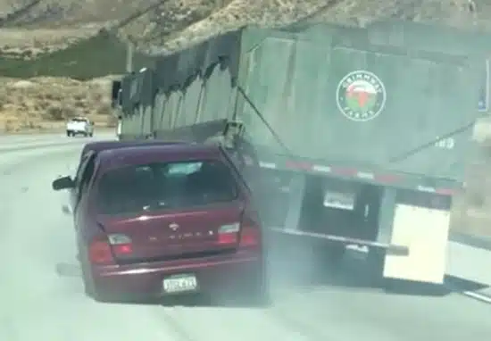 Trucker Dragging Car