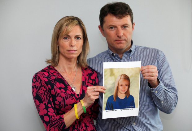 FILE PHOTO - Kate and Gerry McCann pose with a computer generated image of how their missing daughter Madeleine might look now, during a news conference in London