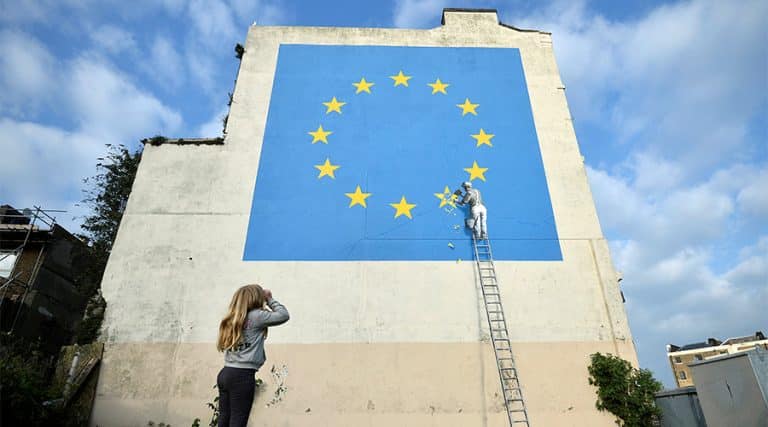 New Banksy Piece Shows Workman Chipping Away At Star On EU Flag