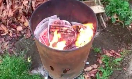 Burning newspapers