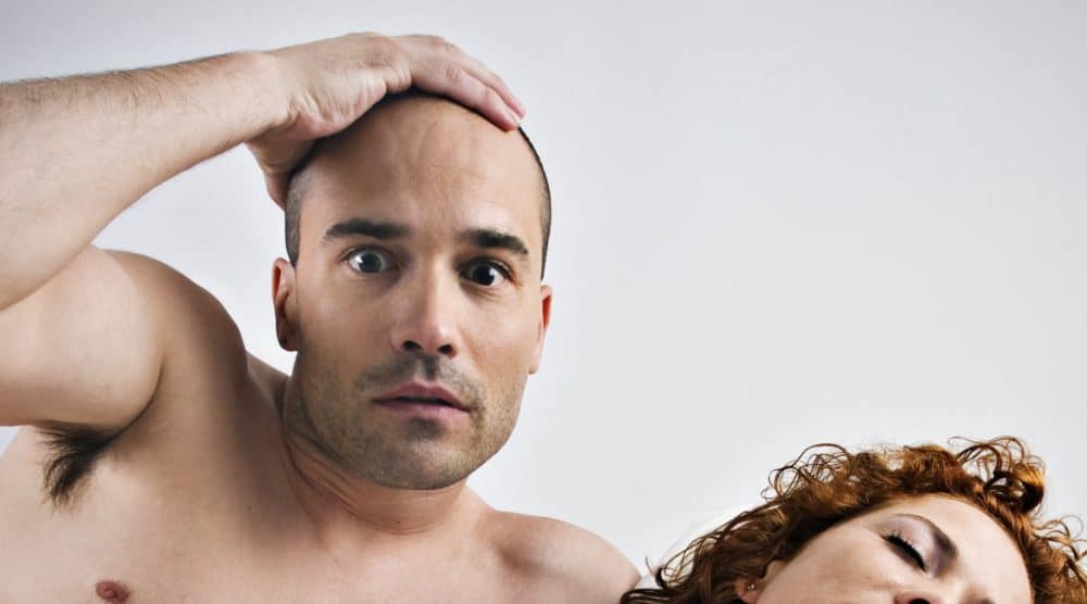 Shocked Man in Bed with Woman