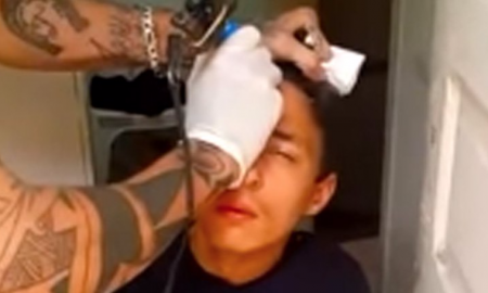 Kid Tattooed Forehead