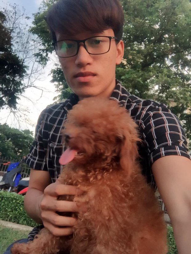 Tran Tien and doggo