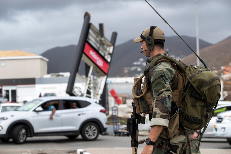 Vehicles and debris from destroyed homes litter the historic district on the Dutch island of St Maarten following a direct hit by Hurricane Irma, a Category 5 storm lashing the Caribbean September 7, 2017 in Philipsburg, St. Maarten. 07 Sep 2017 Pictured: Dutch Marines stand guard to prevent looting and assist residents in the aftermath of Hurricane Irma that devastated much of the island September 7, 2017 in Philipsburg, St. Maarten. Photo credit: ZUMAPRESS.com / MEGA TheMegaAgency.com +1 888 505 6342