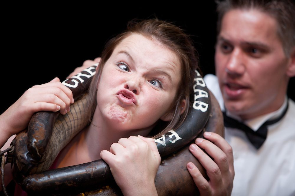 Gurning contests are a rural English tradition. By far the most notable is that held annually at the Egremont Crab Fair, which dates back to 1267 when King Henry III granted the fair a Royal Charter.The origins of the gurning competition itself are unclear, and may not be so old, although it was described as an ancient tradition by local newspaper the Cumberland Paquet in 1852. The competitions are held regularly in some villages, with contestants traditionally framing their faces through a horse collar Ñ known as "gurnin' through a braffin'."The World Gurning Championship takes place annually at the same crab fair in Egremont, Cumbria. Those with the greatest gurn capabilities are often those with no teeth, as this provides greater room to move the jaw further up. In some cases, the elderly or otherwise toothless can be capable of spectacular gurns covering the entire nose.