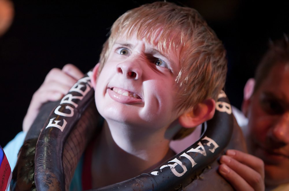 Gurning contests are a rural English tradition. By far the most notable is that held annually at the Egremont Crab Fair, which dates back to 1267 when King Henry III granted the fair a Royal Charter.The origins of the gurning competition itself are unclear, and may not be so old, although it was described as an ancient tradition by local newspaper the Cumberland Paquet in 1852. The competitions are held regularly in some villages, with contestants traditionally framing their faces through a horse collar Ñ known as "gurnin' through a braffin'."The World Gurning Championship takes place annually at the same crab fair in Egremont, Cumbria. Those with the greatest gurn capabilities are often those with no teeth, as this provides greater room to move the jaw further up. In some cases, the elderly or otherwise toothless can be capable of spectacular gurns covering the entire nose.